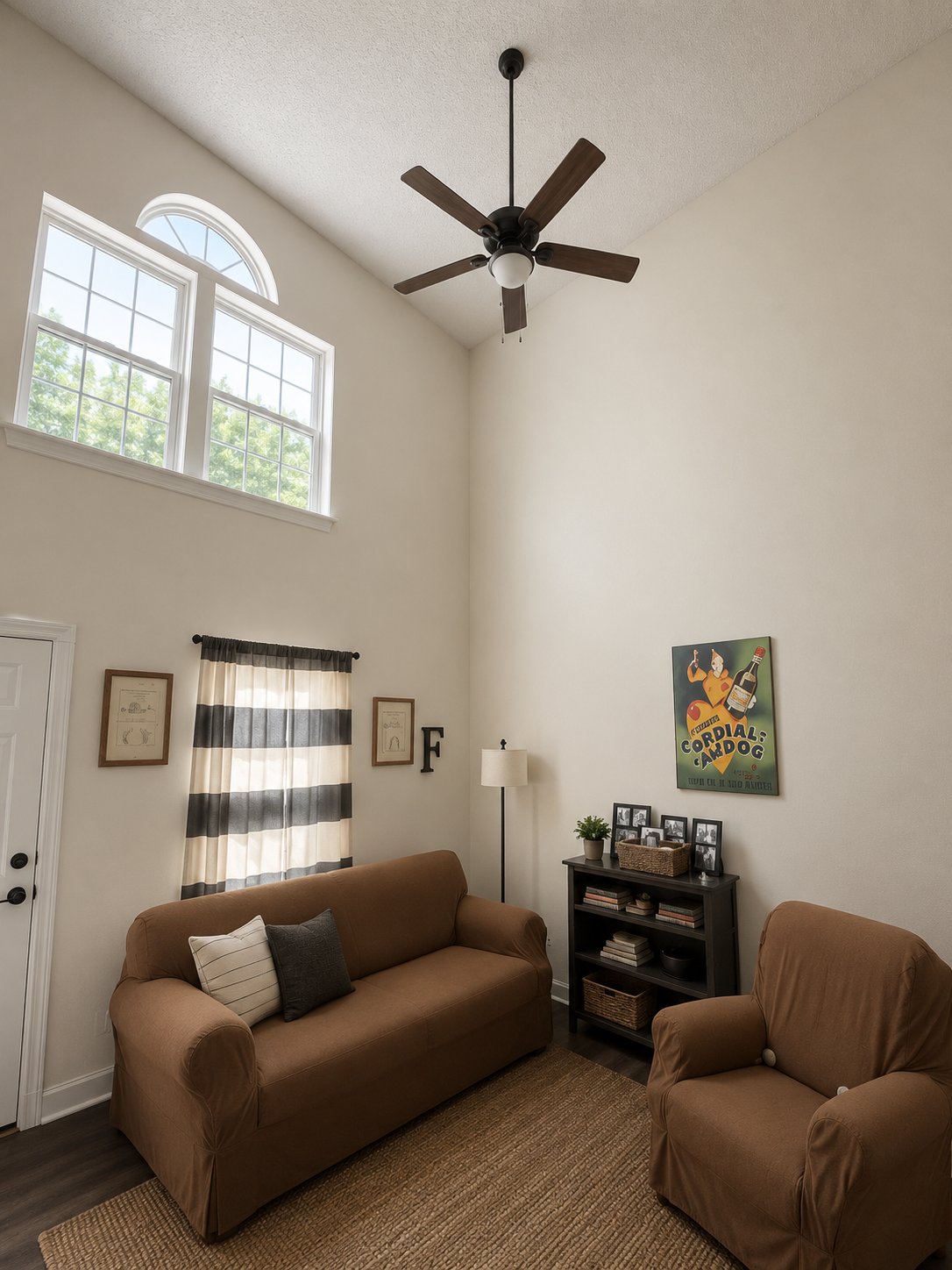 TV mounted above cabinet wall unit full-motion arm Raleigh NC