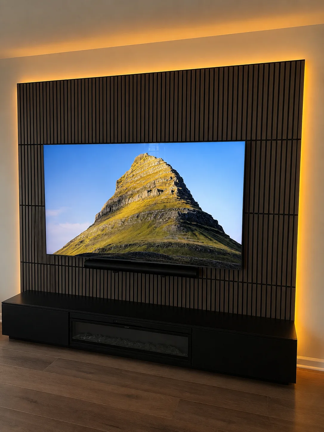 Slat wall panel detail with warm LED backlight and Sonos soundbar Chapel Hill