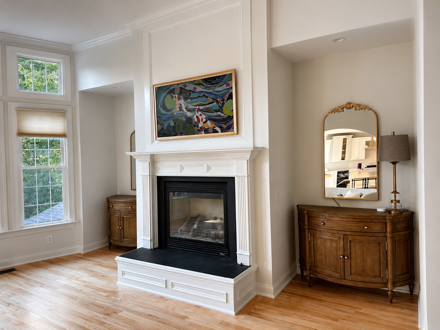 55 inch Samsung Frame TV installed above white fireplace in Cary NC